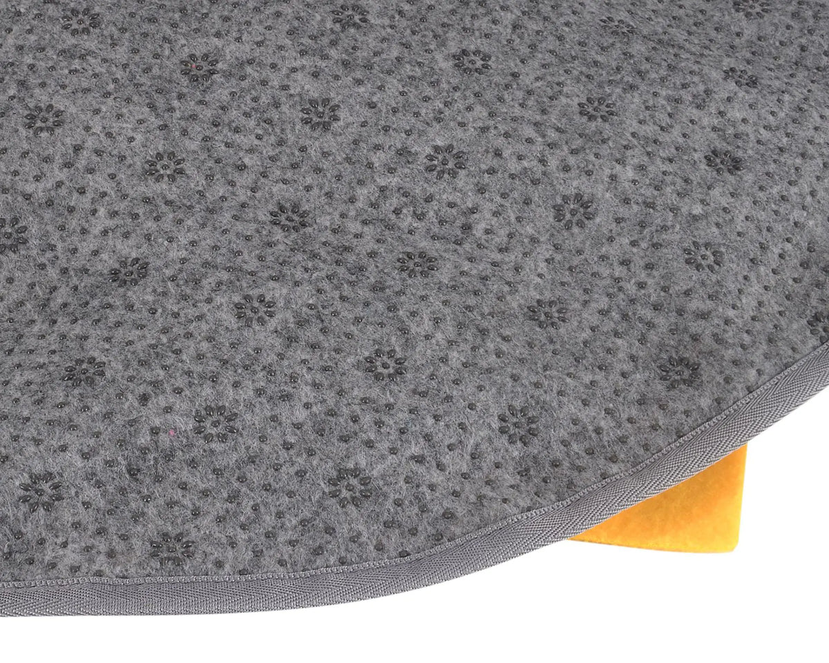 Dog sniffing for treats in the snuffle mat petals
