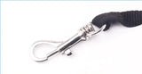 LED retractable dog leash with waste bag dispenser